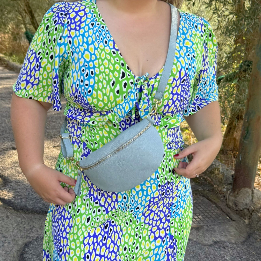 La Piccola Borsa Sling con Tracolla Regolabile