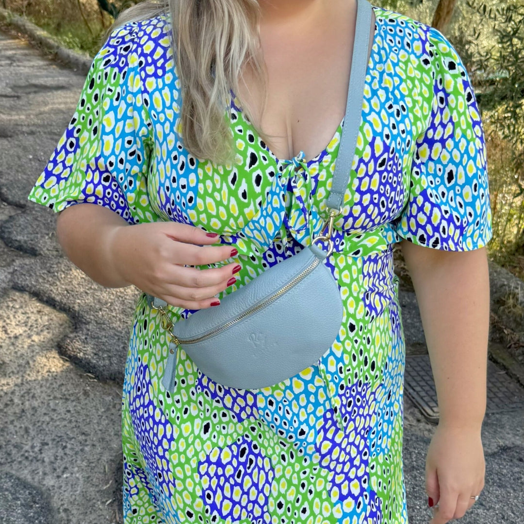 La Piccola Borsa Sling con Tracolla Regolabile